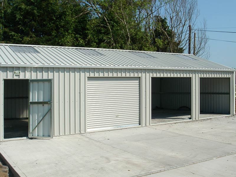 12.2m x 6m Bronze Range Goosewing Grey garage with rollers on side wall Shanette Sheds