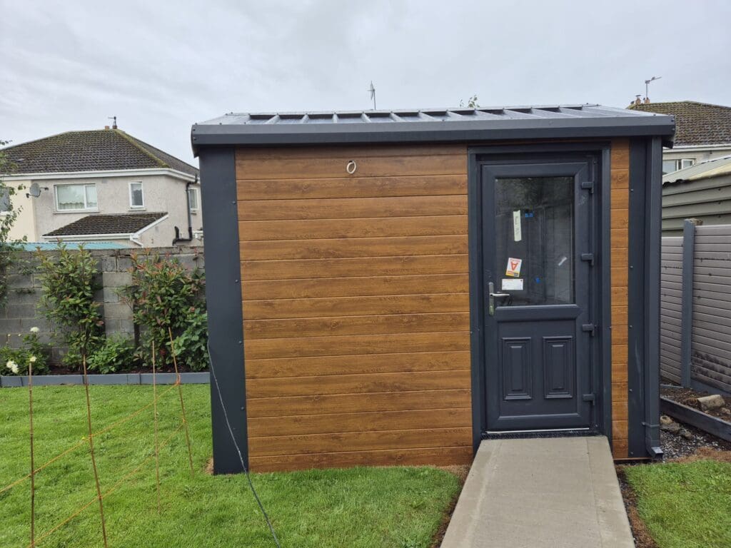 Insulated steel home office garden shed shed Shanette in Kilbeggan in Golden Oak with Anthracite flashings