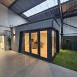 Modern Garden Room/Home Office with Stylish Design and Functional Workspace